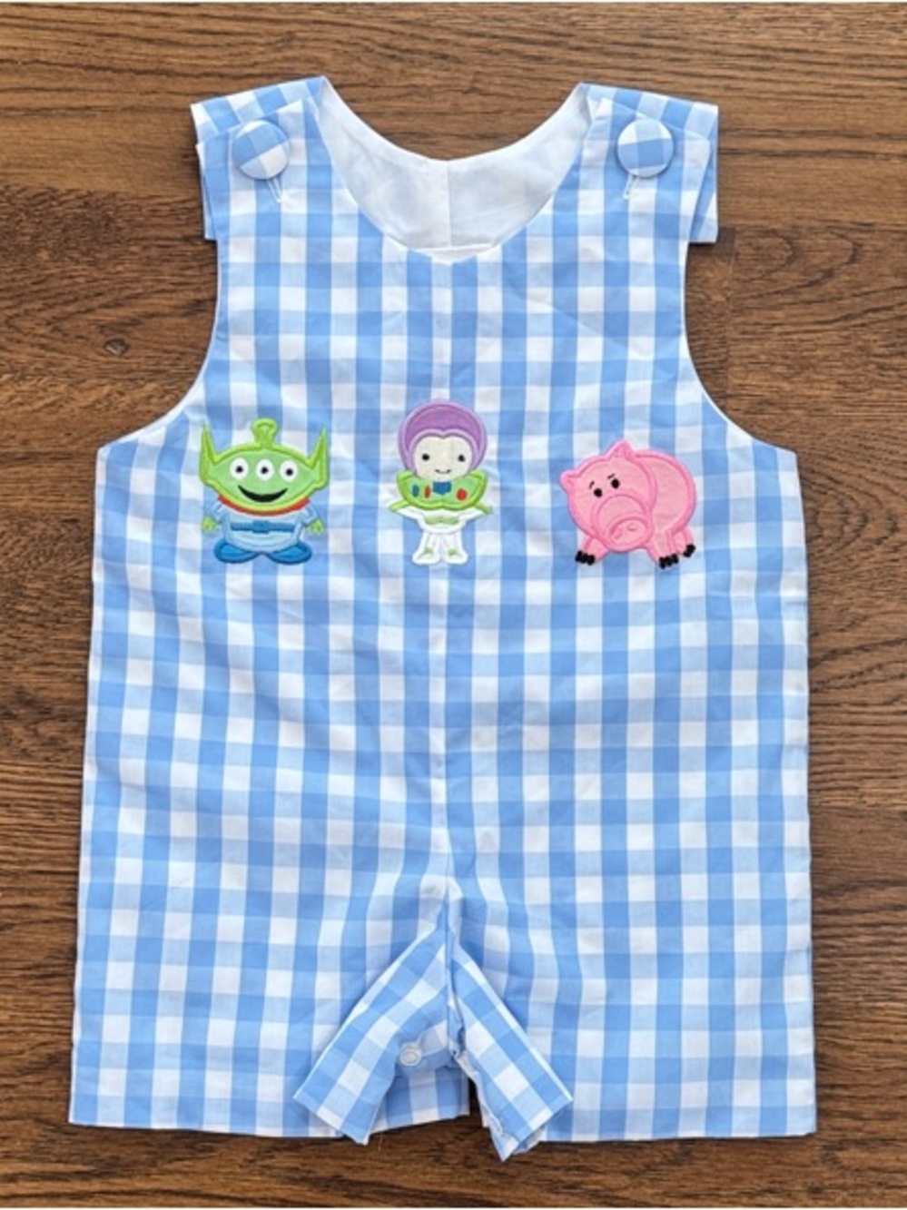 Stitchy Fish Blue Gingham Romper with Toy Story Appliqués